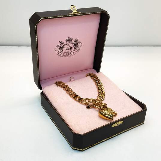 Buy the Juicy Couture Gold Tone Heart Charm Toggle 16 1/2 Inch Necklace  100.0g