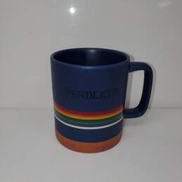 Pendleton Blue D/W M/W Safe Ceramic Mug w/ Rainbow Strip Around It