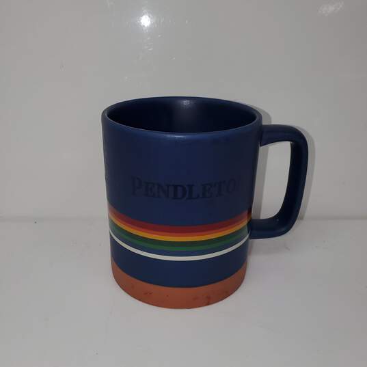 Pendleton Blue D/W M/W Safe Ceramic Mug w/ Rainbow Strip Around It image number 1