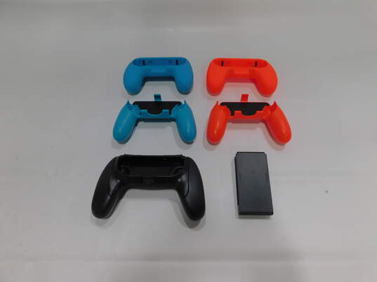 Various Nintendo Switch Joy Con Grips and Accessories image number 2