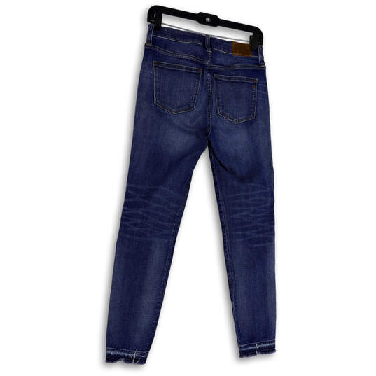 Womens Blue Denim Medium Wash Distressed Pockets Skinny Leg Jeans Size 27 image number 2