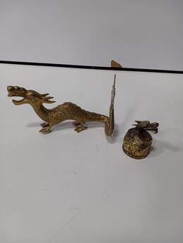 Two Brass Dragon Decorations