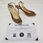 AUTHENTICATED Jimmy Choo Gold Lamé & Leather Platform Peep Toe Slingback Heels image number 1