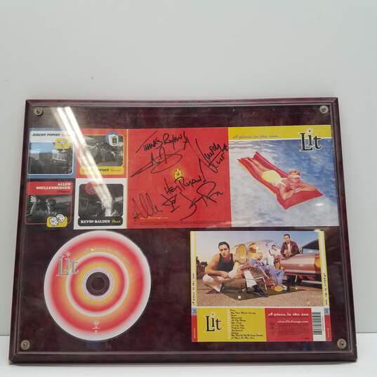 Band Signed Lit CD- A Place in The Sun image number 1