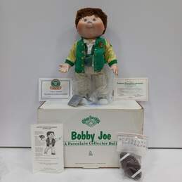 The Danbury Mint OAA Cabbage Patch Kids A Porcelain Collector Doll Bobby Joe with COA and Other Paperwork