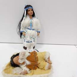 Pair of Native American Indian Porcelain Dolls