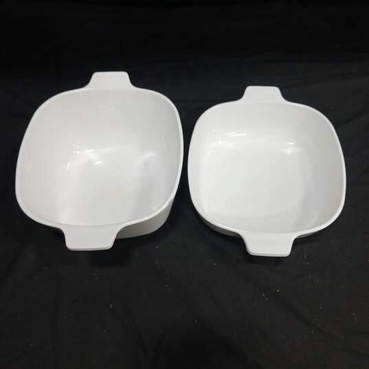 Pair of White Corning Ware Dishes w/ 1 Lid image number 3