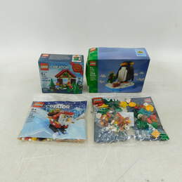 LEGO 40498 Christmas Penguin, 40082 Limited Edition 2013 Holiday Set, 30580 Santa Claus, and 40609 Christmas Fun VIP Add-On Pack Sets (4)