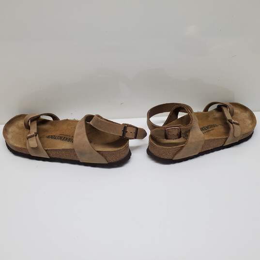 Wm Birkenstock Yara Tobacco Brown Sandals W/Designer Ankle Strap Sz M7 image number 1