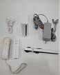 Nintendo Wii with 2 controllers and 1 Nunchuck image number 1