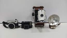 Lot of Vintage Cameras, Lenses, Flashes, And Cases alternative image