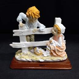 Porcelain Capodimonte Boy & Girl w/Puppies Figurine