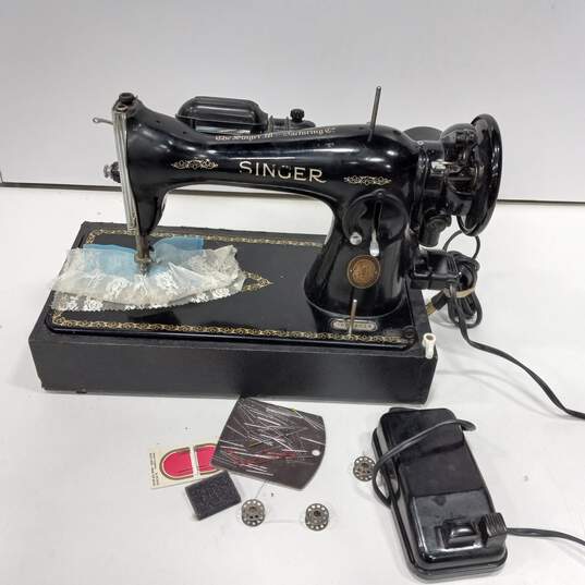 Vintage Singer Sewing Machine with Accessories & Foot Pedal image number 1