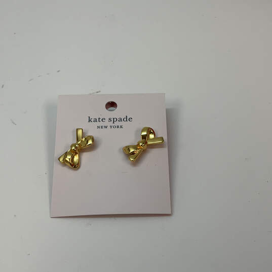 Designer Kate Spade Gold-Tone Skinny Mini Bow Shape Classic Stud Earrings image number 1
