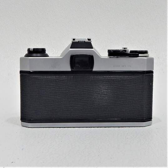 Pentax K1000 SLR 35mm Film Camera W/ Lenses Flash Manuals Case image number 5
