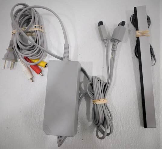 Nintendo Wii with 2 controllers and 1 Nunchuck image number 2