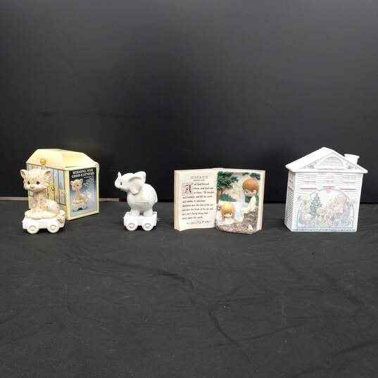 Bundle of Four Precious Moments Figurines image number 1