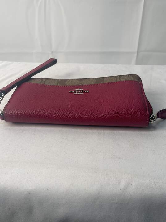 Certified Authentic Coach Wine Color Wristlet image number 3