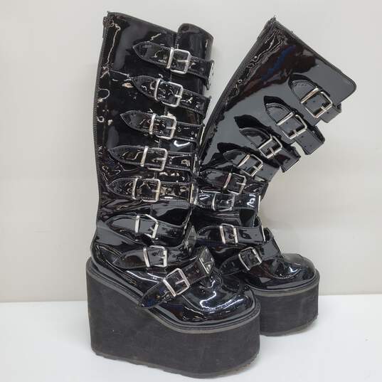 Demonia Black Leather Knee High Platform Wedge Boots image number 1