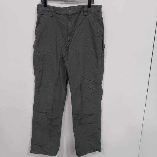 Men’s Carhartt Loose Original Fit Cargo Jeans Sz 36x34 image number 1