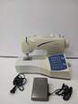 Singer Futura CE-100 Sewing Machine with Foot Pedal & Power Cord image number 1