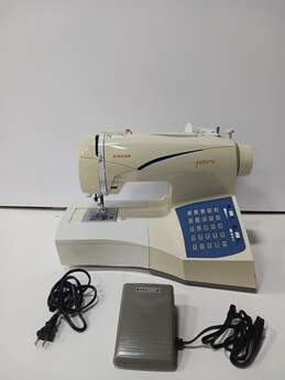 Singer Futura CE-100 Sewing Machine with Foot Pedal & Power Cord