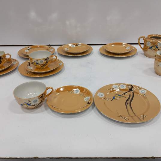Bundle of 12 Assorted Peach Tone Ceramic Floral Plates w/3 Matching Cups and Matching Cream and Sugar Sets image number 3