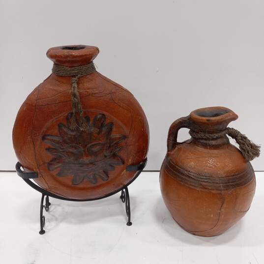 Pair of Large Italian Style Leather Covered Bottles image number 1