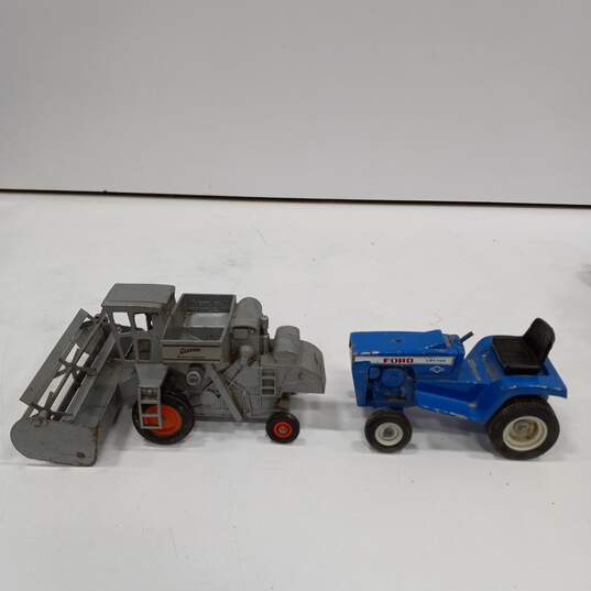 7 pc Assorted Vintage Metal Tractors image number 4