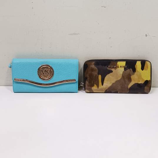 Pair of Multicolor Michael Kors Wallets image number 1