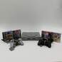 Sony PlayStation W/ 4 Games and 2 Controllers image number 1