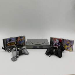 Sony PlayStation W/ 4 Games and 2 Controllers