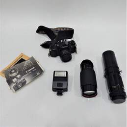 Canon A-1 35mm SLR Film Camera w/ 3 Lens, Flash, Manuals