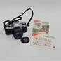 Canon AE-1 SLR 35mm Film Camera With Lens & Manual image number 1