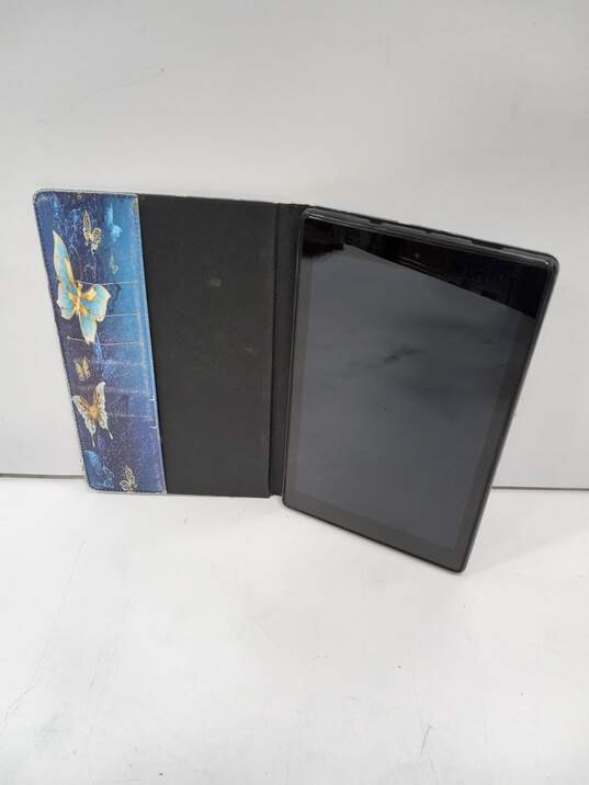 Amazon Fire HD 10 (7th Gen) Tablet Model: SL056ZE In Blue Butterfly Case image number 1