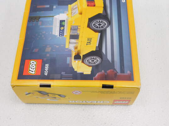 Creator Factory Sealed Sets 31058: Mighty Dinosaurs 40468: Yellow Taxi & 30580: Santa Claus image number 4