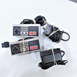 Nintendo NES Console w/ Controllers and Wires alternative image
