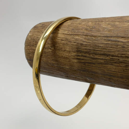 Designer Kate Spade New York Gold-Tone Round Shaped Bangle Bracelet image number 1