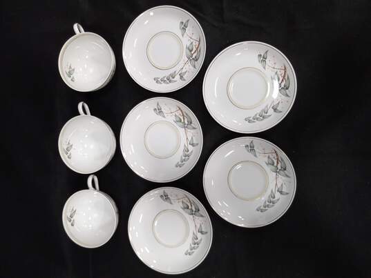 China Set of 4 White Teacups And 5 Saucers w/ Floral Pattern image number 2