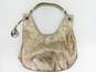 Michael Kors Light Gold Metallic Hobo Handbag image number 1