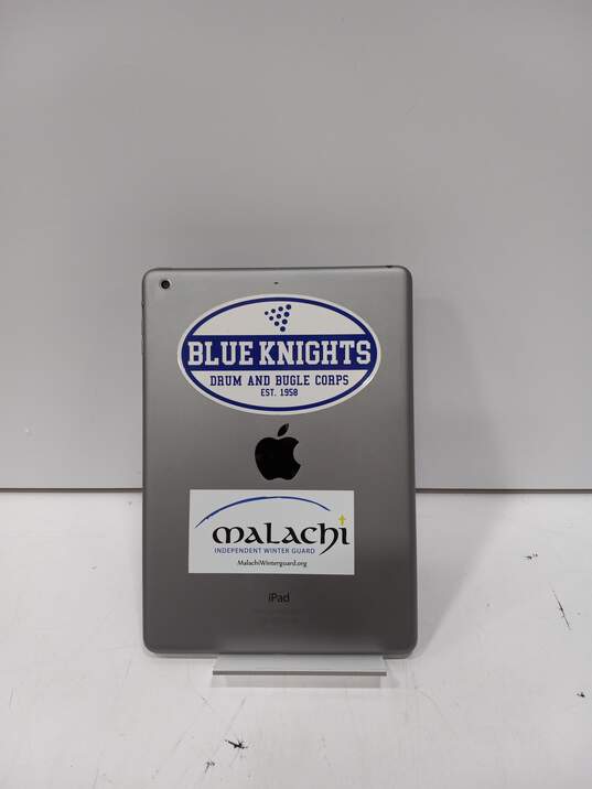 Apple iPad Air Tablet Model: A1474 With BLUE KNIGHTS DRUM AND BUGLE CORPS 1958 Sticker And Malachi Winterguard Sticker On Back image number 2