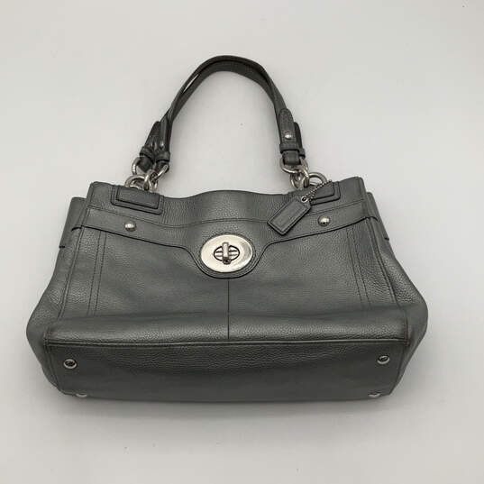 Womens Penelope Black Leather Inner Pockets Bottom Stud Zipper Shoulder Bag image number 1