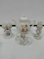 Bundle of Four Precious Moments Figurines image number 1