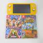 Yellow Nintendo Switch Lite W/ 2 Games Portal Knights Carnival Games image number 1