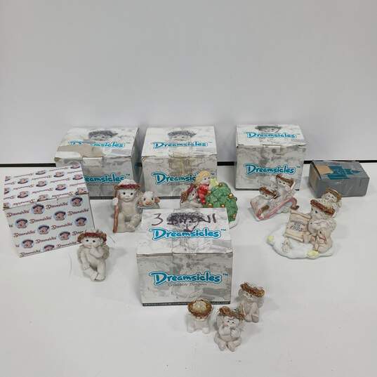 Bundle of 8 Assorted Vintage Dreamsicles Figurines w/Boxes image number 1