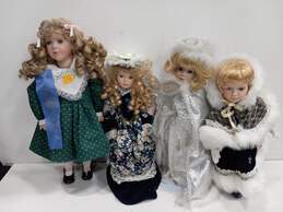 Bundle of 4 Porcelain Dolls