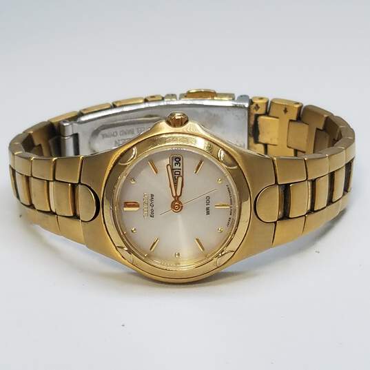 Citizen Eco-Drive E-000 25mm Gold Tone Date Analog Bracelet Watch 54.0g image number 6