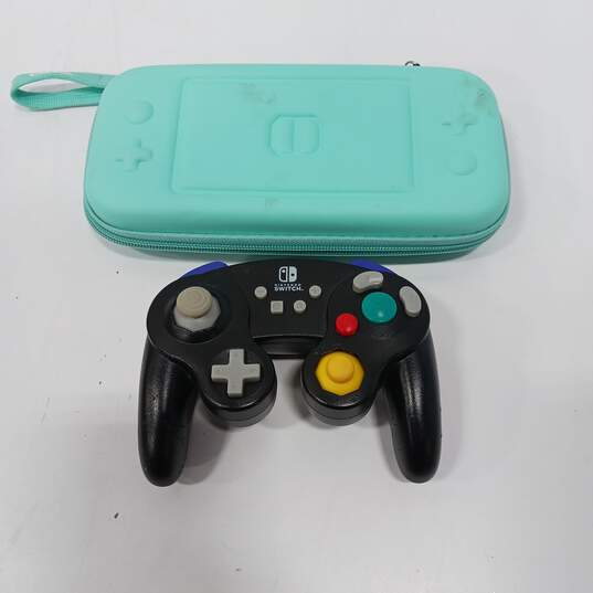 Nintendo Switch Lite Model w/ Case & Controller image number 2
