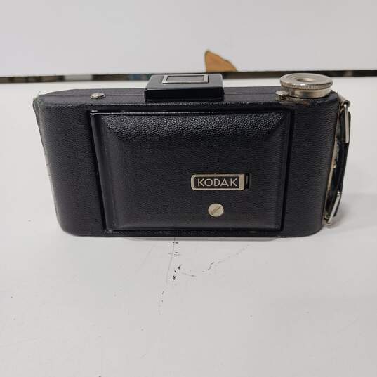Vintage Black Compact Kodak Hand Held Camera image number 1