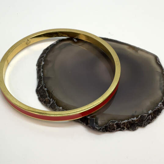 Designer Kate Spade Gold-Tone Red Enamel Round Shape Bangle Bracelet image number 1
